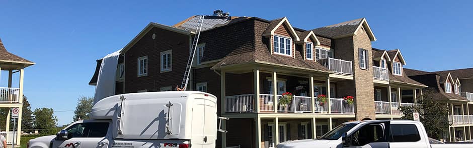 Réfection de la toiture d'un immeuble à condos